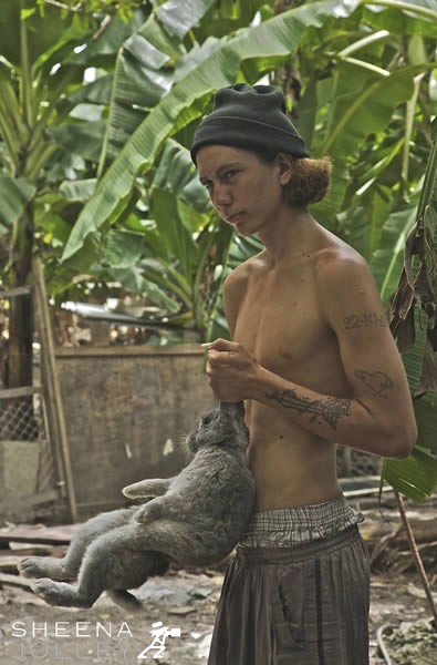 Terrence Bailey and one of his rabbits.jpg - 